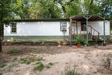 view of the home with side porch