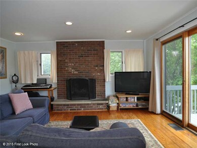Living Room. Cozy fireplace and recessed lighting