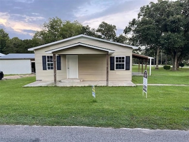 View of front facade with a front lawn