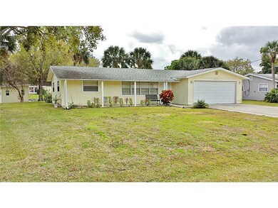 Exterior Front. Canal home includes large shed!