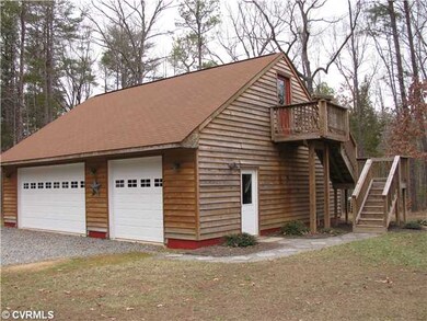 Parking Lot/Garage - Detached 3 car garage with upstairs storage