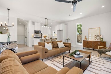 Living area featuring a chandelier, recessed ligh