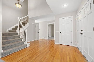 Entryway with hardwood floors