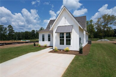 Example of Tate A Front view by Holland Homes LLC.