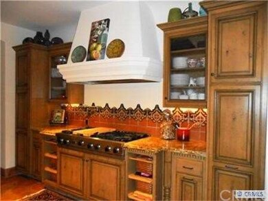 Gorgeous Cabinetry and Mediterranean Design
