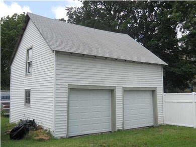 Two car garage with new lightweight garage doors.