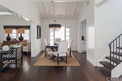 Spacious floor plan reveals pitched ceilings and c