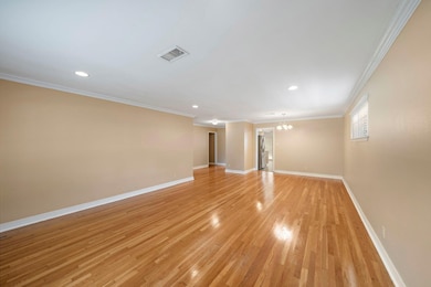 Positioned conveniently between the kitchen and li