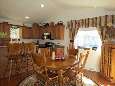 Dining Room. Dining Room/Kitchen has cathedral cei