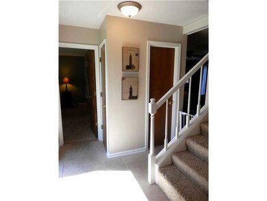 Entry. Beautiful Tiled Foyer with Glass Storm Door! Convenient Floor Plan ~ Quick Access to Master Bedroom, Great Room, Dining Room, Kitchen & Upstairs!