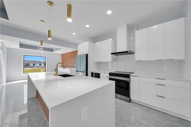 2512 29th St SW, Lehigh Acres, FL 33976 - photo 4