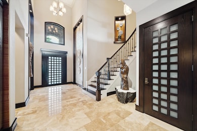 From the moment you step inside, this stunning foy