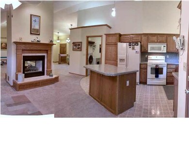 KITCHEN/DINING with see thru Gas Fireplace