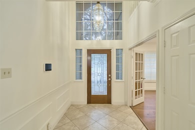 Gorgeous foyer with soaring ceiling.