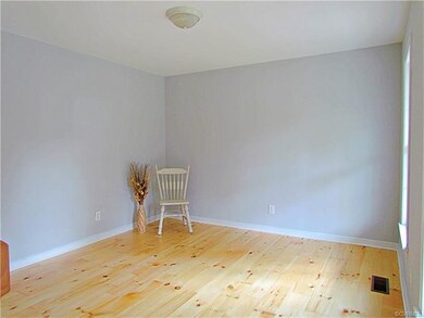Formal dining room to the right of entrance