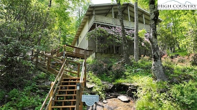 View from Lake Rd parking. Road to road plus extra lot for a total of 3 lots.