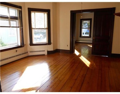 Living Room. Hardwood floors throughout. Bow windo
