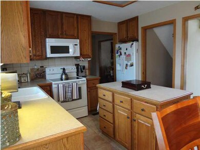 Kitchen has an island for extra counter space
