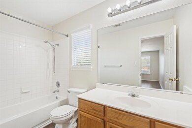 Full bath with toilet, visible vents, shower / ba
