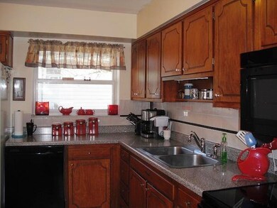 Barwood kitchen with tile backsplash
