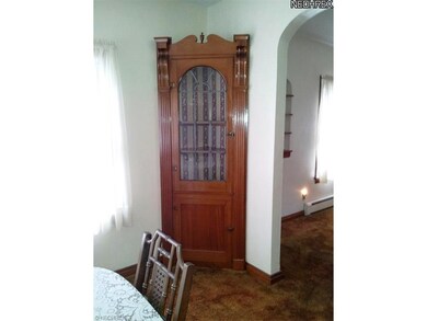 Two corner built in china cabinets in the dining r