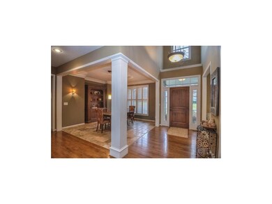 SOARING ENTRY & GLEAMING HARDWOOD FLOORS!