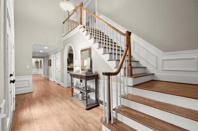 Dramatic entryway with a two-story foyer.
