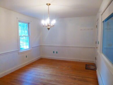 SPACIOUS DINING ROOM IS RIGHT OFF OF...
