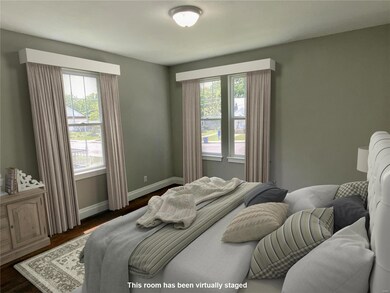 Main BedroomThe room has been virtually staged