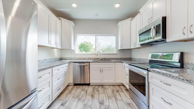 All stainless appliances stay! Refrigerator, stove, microwave and dishwasher!