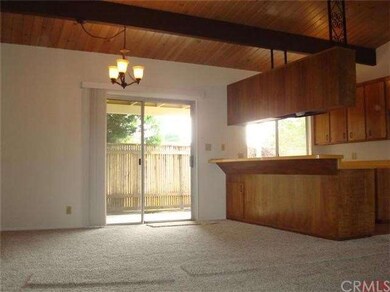 Another view of the dining area and breakfast bar.