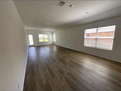 View of front of house featuring brick siding, dr
