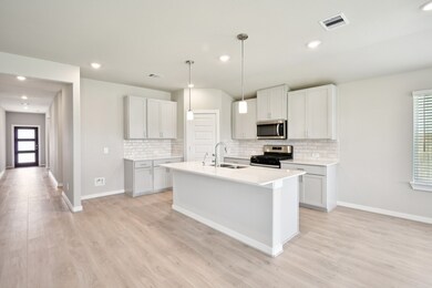 Photo is not of the actual home, but is an inspirational photo of builder’s model home and may depict options, furnishings, and/or decorator features that are not included