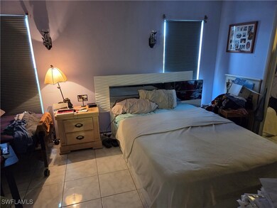 Bedroom featuring light tile patterned floors