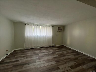 Living room w A/C window unit