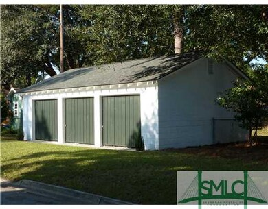 Parking Lot/Garage. Three-Car Detached Garage Buil