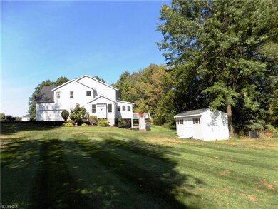 View from the side yard. Homes sits on 1.5 acres. 