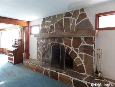 Family Room FAMILY ROOM WITH HANDCRAFTED STONE FIR