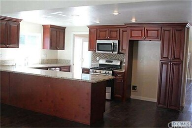 New kitchen appliances with new cherry cabinets