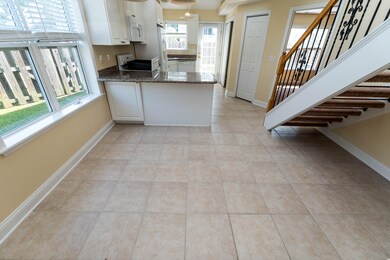 Eat-In Area and Kitchen from Living Room