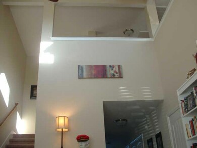 Looking up from the Living room to the Second Floor.