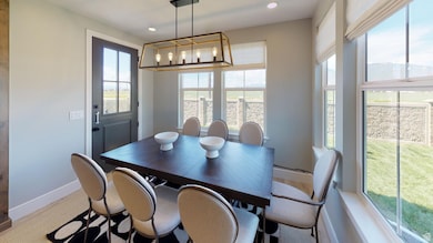 Dining area with a chandelier