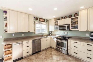 Cabinets are coffee glazed cream, door handles are