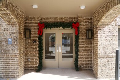 View of exterior entry featuring french doors