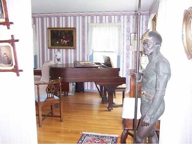 Living Room. As your guests enter through the fron