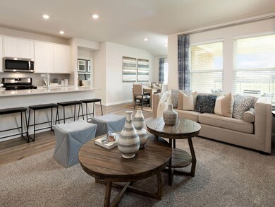 Living area with recessed lighting, plenty of nat