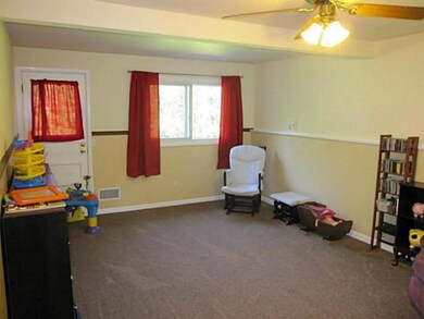 Family Room Lower-Level,  Carpeted Room, With Walk