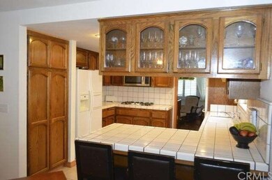 TILED KITCHEN WITH PLENTY OF STORAGE AND COUNTER S