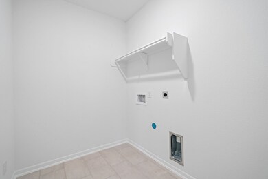 The laundry room layout is carefully planned for o
