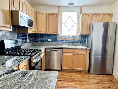 1648 Winona Ct unit 1, Denver, CO 80204 - photo 3